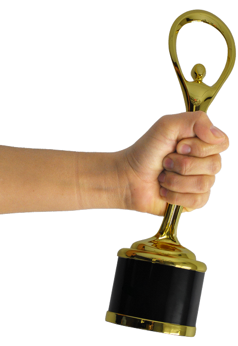 DesignIsYummy_Hand-Award A hand tightly grips a shiny gold trophy with a black base against a plain white background.
