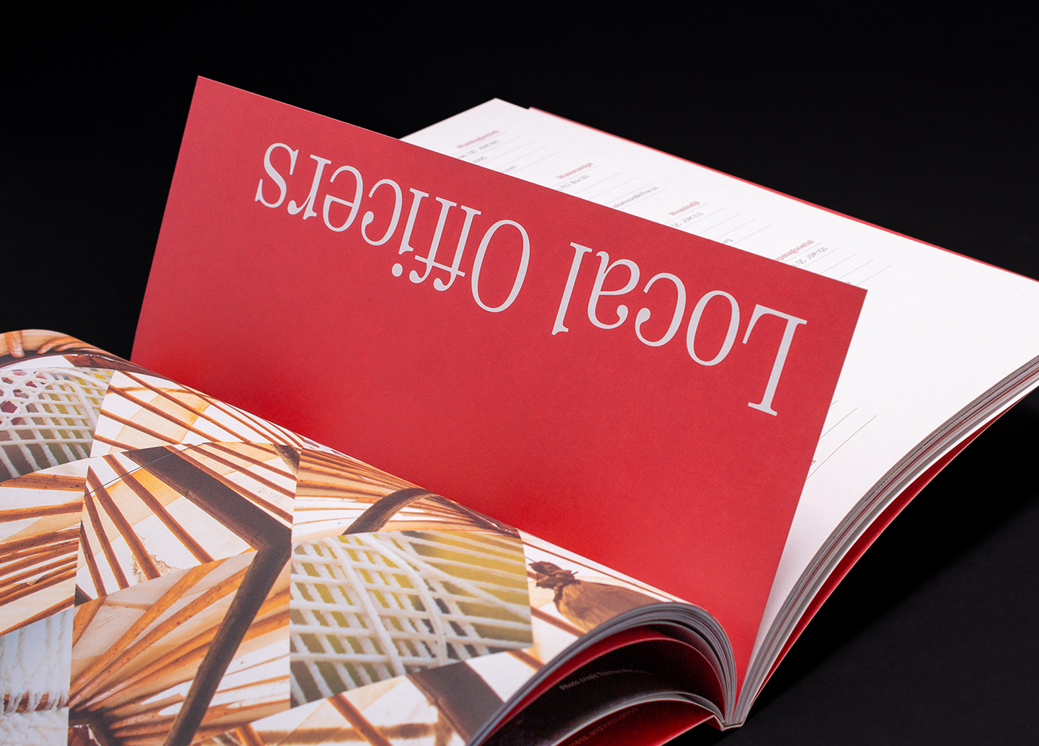 Niskamoon_202223-1 An open book displays a red page with the upside-down white text