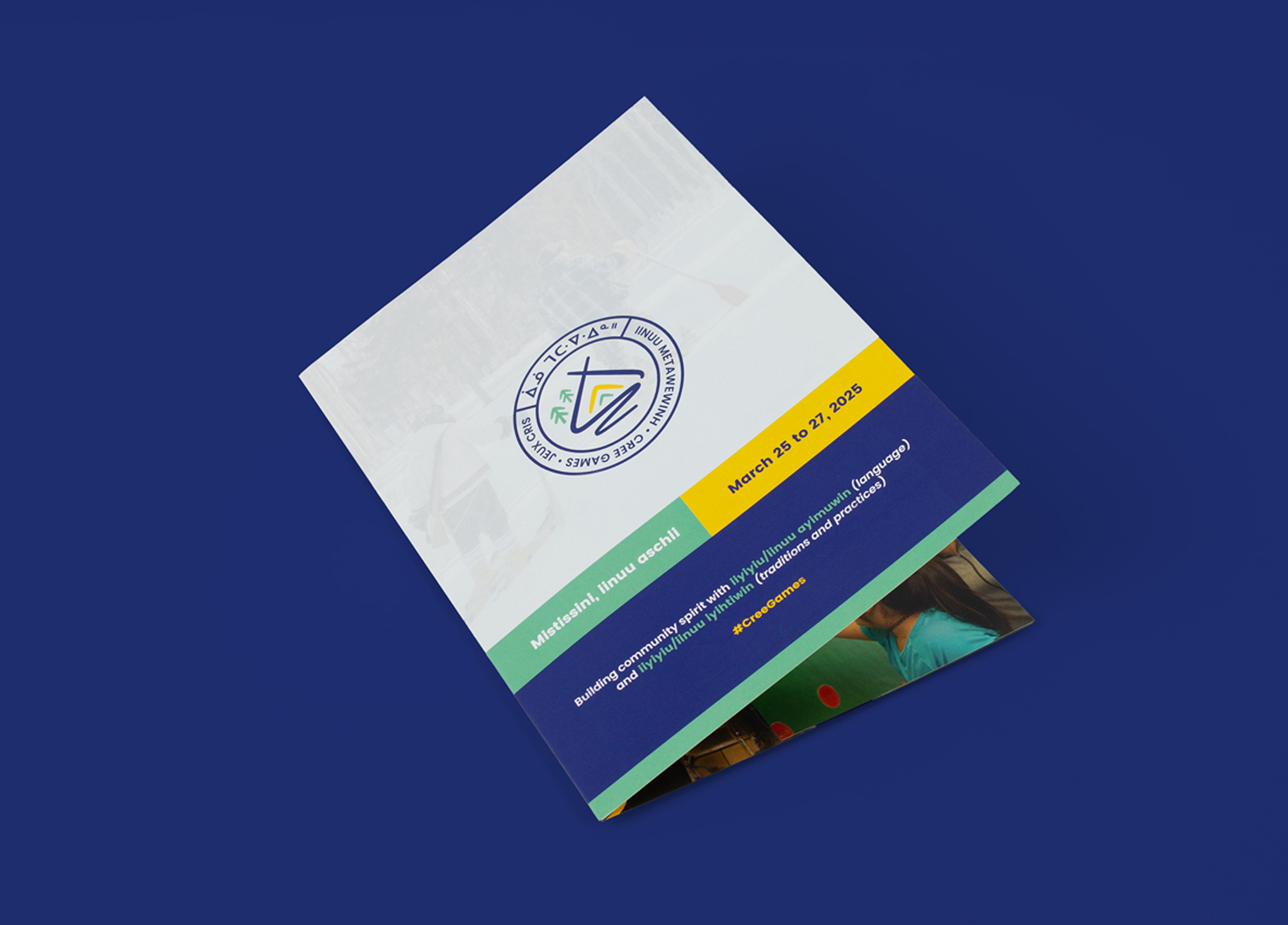 A brochure with a colorful cover featuring a circular logo, blue, green, and yellow sections, and event details reading