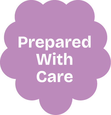 A purple flower-shaped badge with the white text "Prepared With Care" in the center.