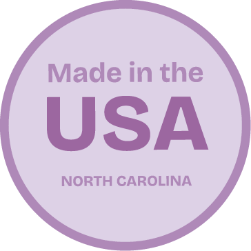 A circular purple badge with the text "Made in the USA" in the center and "NORTH CAROLINA" underneath.