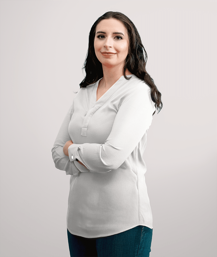 A woman with her arms crossed.